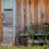 Old wooden wall and green bicycle